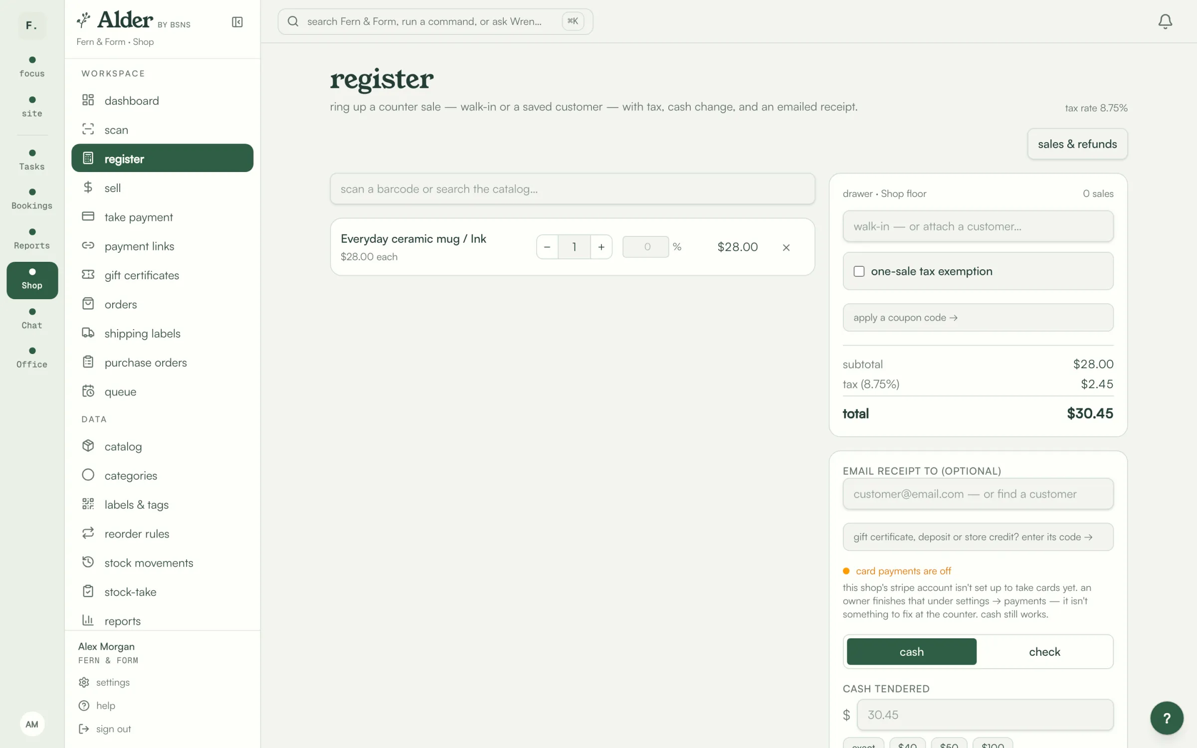 The Alder register on web, with a ceramic mug in the sale, the tax and the cash tender